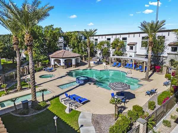Resort-style swimming pool at Bella Mirage Apartments offering luxury outdoor relaxation
