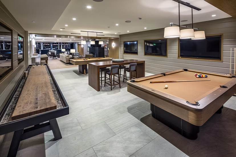 Game room with pool table and modern decor at Palisade at Westfield UTC Apartments