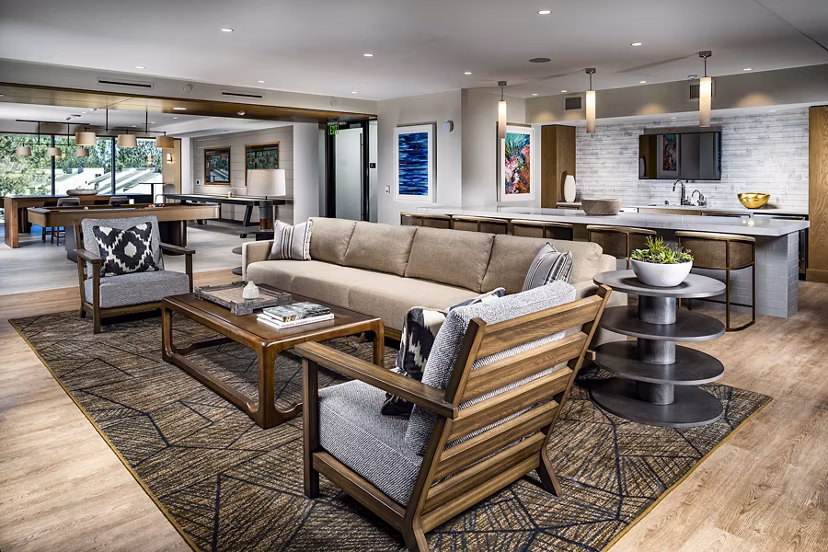 Clubhouse featuring modern decor and entertainment areas at Palisade at Westfield UTC Apartments