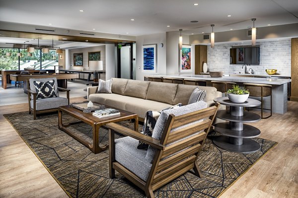Clubhouse featuring modern decor and entertainment areas at Palisade at Westfield UTC Apartments
