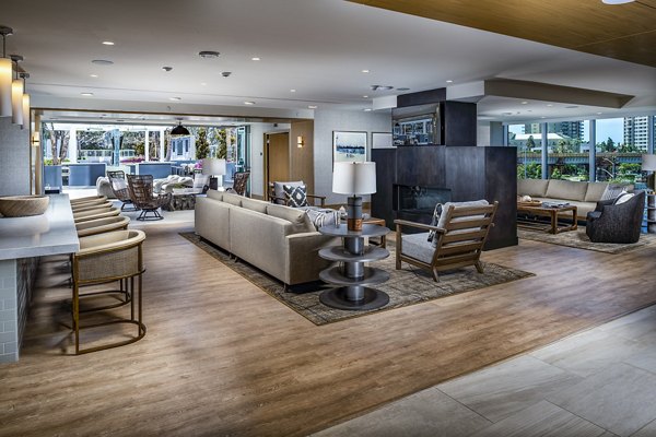 Modern clubhouse with stylish seating and communal space at Palisade at Westfield UTC Apartments, perfect for social gatherings and relaxation