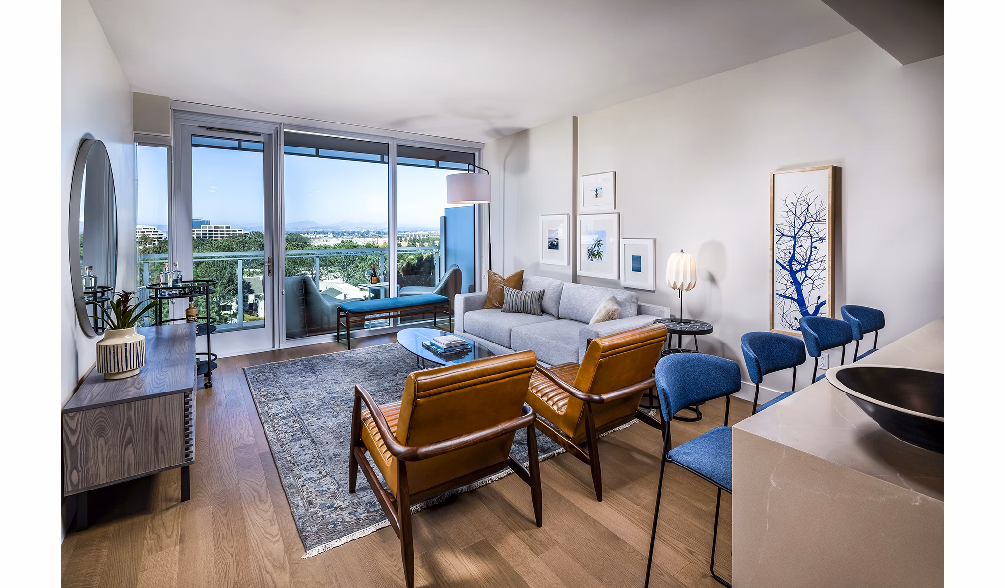 Spacious living room with modern decor in Palisade at Westfield UTC Apartments