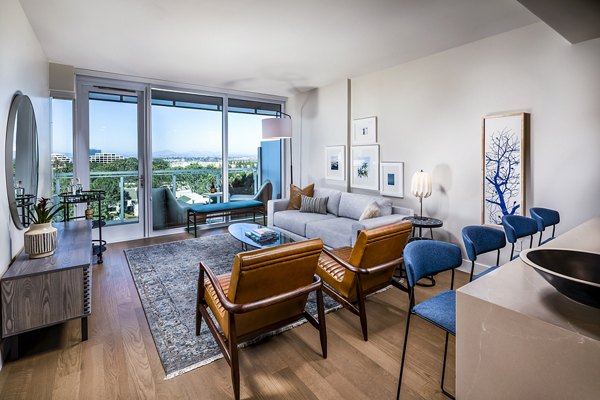 Spacious living room with modern decor in Palisade at Westfield UTC Apartments