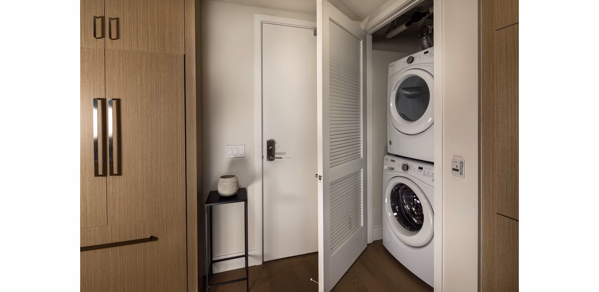 Laundry room featuring modern machines at Palisade at Westfield UTC Apartments