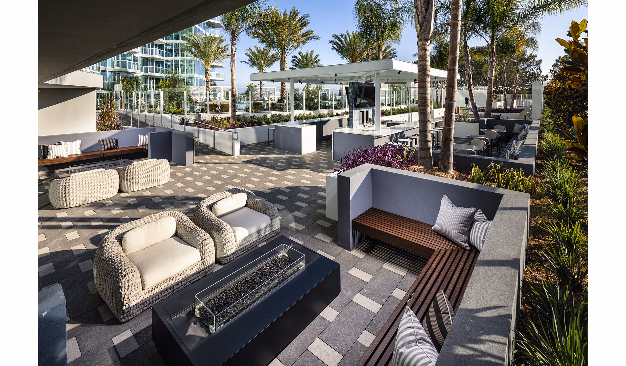 Palisade at Westfield UTC: Modern patio with comfortable seating and lush landscaping for luxury living