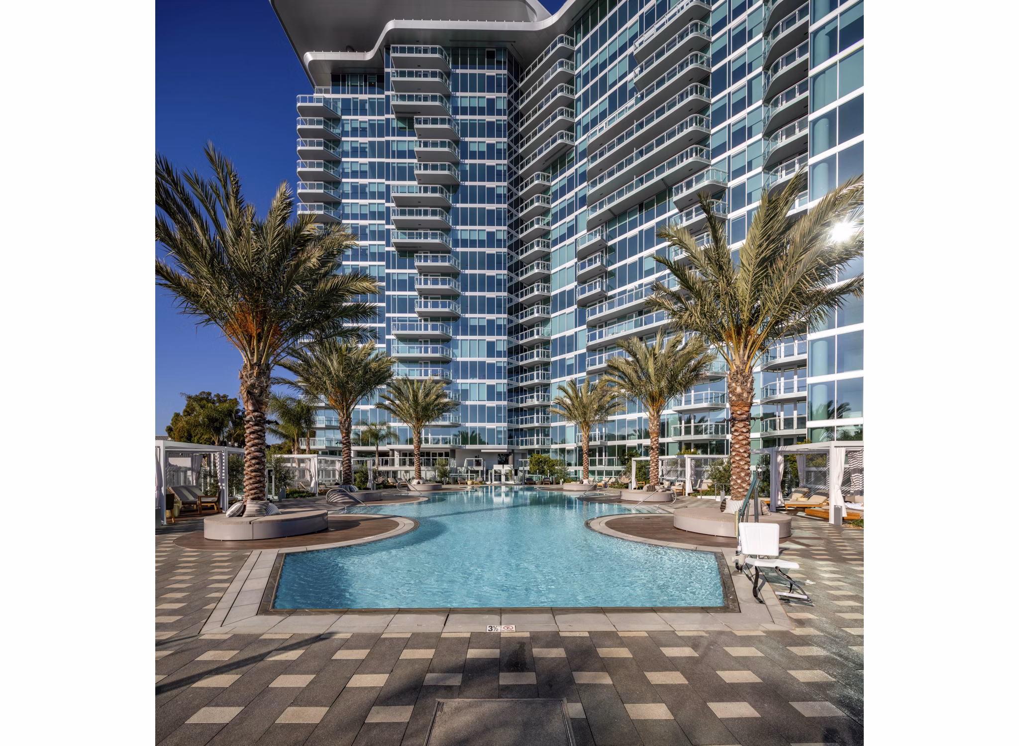 Spacious pool with lounging areas at Palisade at Westfield UTC Apartments, perfect for relaxation and recreation