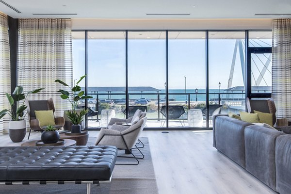 Clubhouse featuring modern design and open seating at 500 Ocean Ave Apartments