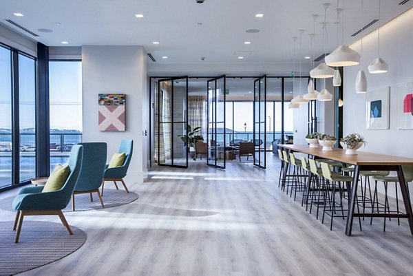 Clubhouse featuring modern design and cozy seating areas at 500 Ocean Ave Apartments