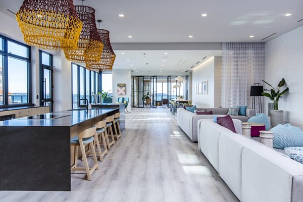 Clubhouse kitchen with sleek countertops and modern appliances at 500 Ocean Ave Apartments
