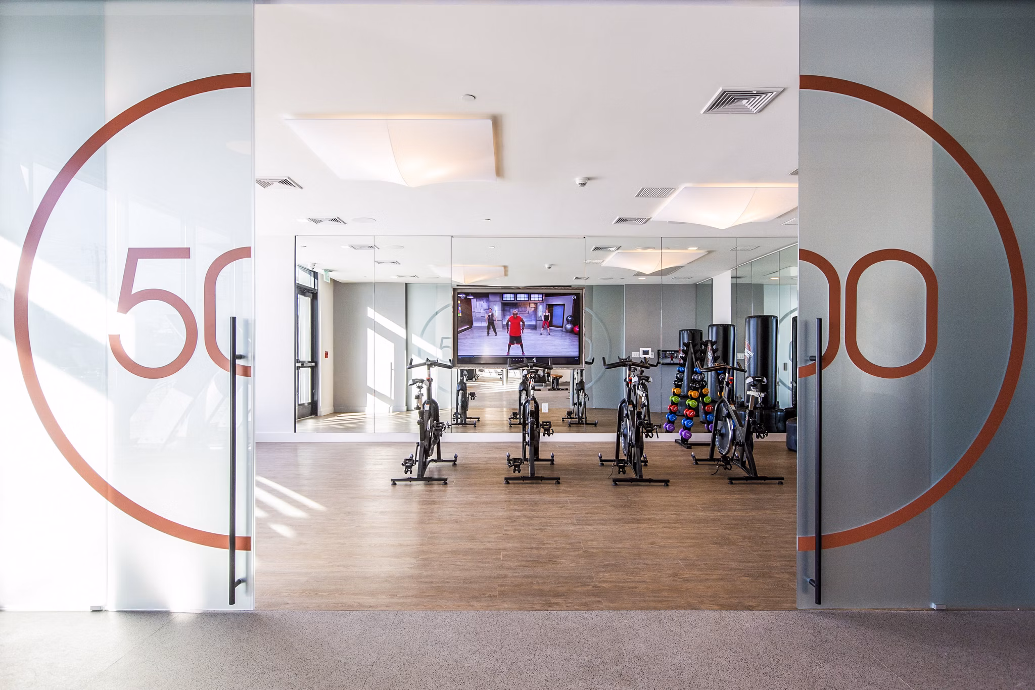 Modern fitness center with state-of-the-art equipment at 500 Ocean Ave Apartments, a Greystar luxury community