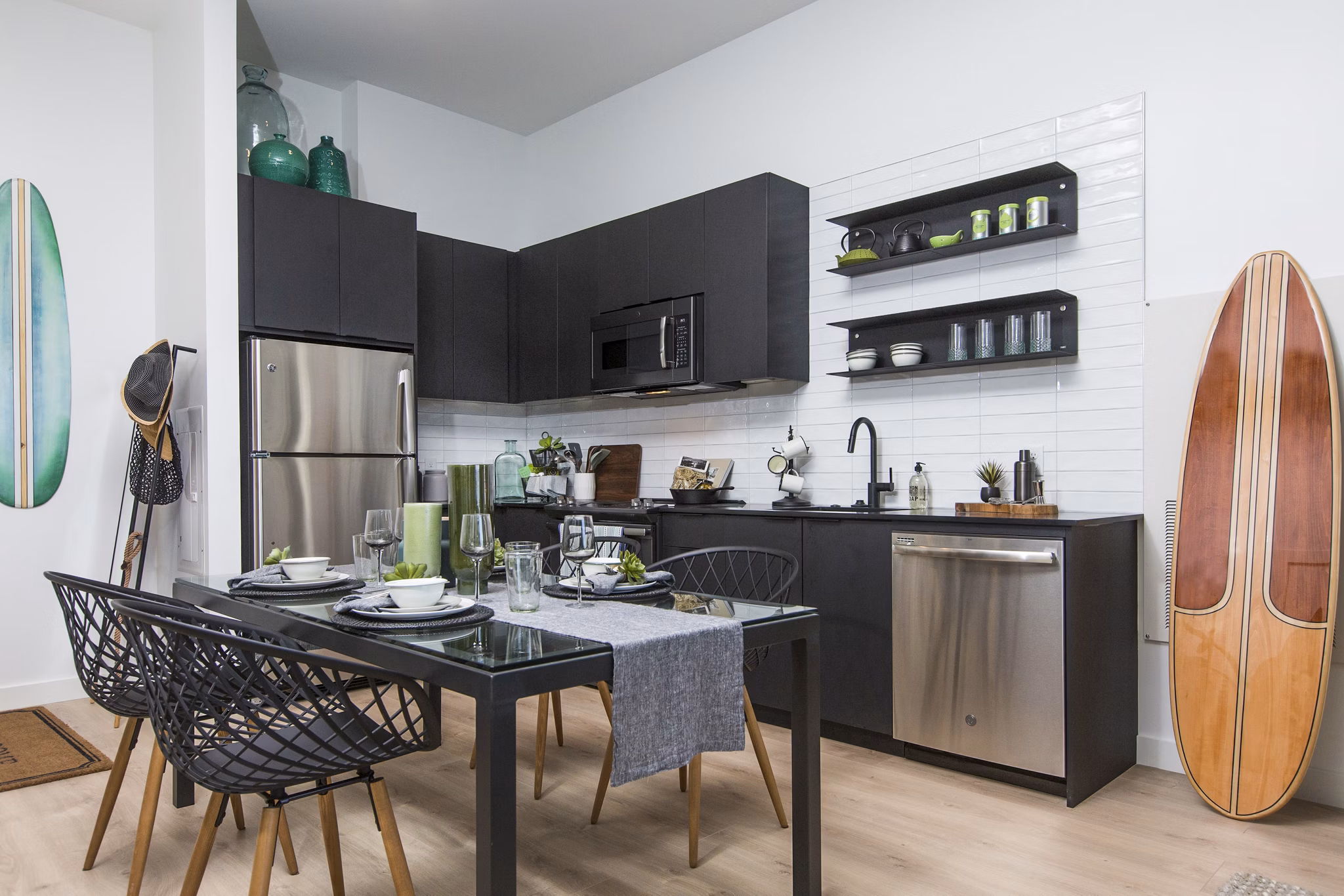 Modern kitchen with stainless steel appliances at 500 Ocean Ave Apartments