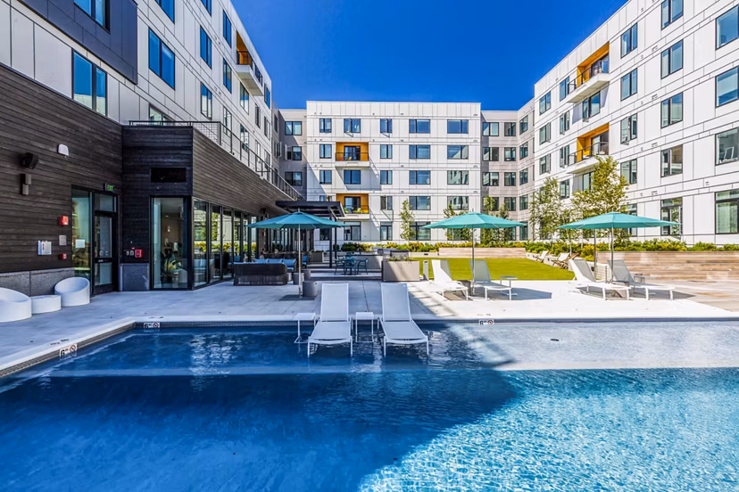 Modern rooftop pool with ocean views at 500 Ocean Ave Apartments, a luxury Greystar community