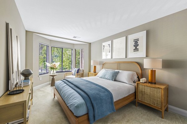 Modern bedroom with natural light at Poplar Glen Apartments, luxury living with elegant decor