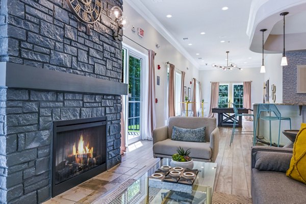 Elegant clubhouse with modern decor at Poplar Glen, featuring comfortable seating and social spaces for community events
