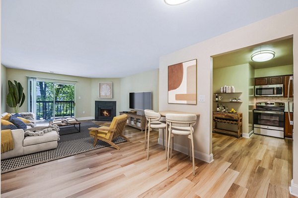 Dining room with modern decor and sleek furniture at Poplar Glen Apartments, a Greystar luxury community