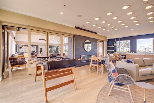 Contemporary clubhouse with cozy seating and modern decor at Admirals Cove Apartments