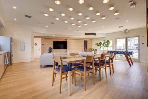 Clubhouse with elegant interior design at Admirals Cove Apartments, a Greystar luxury community in a serene waterfront setting