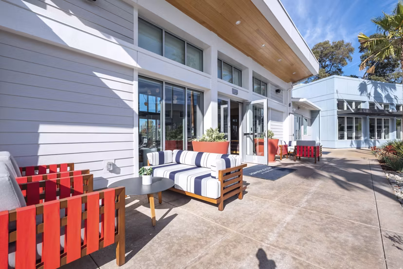 Inviting patio with comfortable seating at Admirals Cove Apartments, a Greystar luxury apartment community offering outdoor relaxation space
