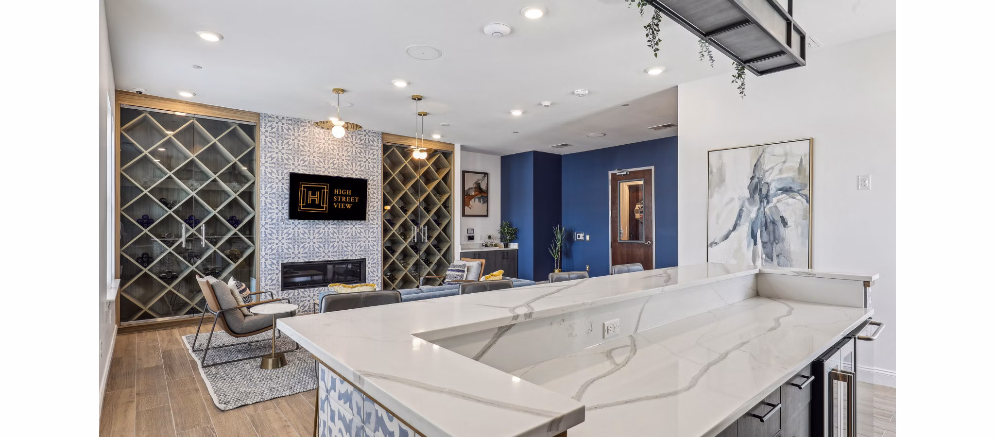 Contemporary clubhouse with seating areas at High Street View Luxury Apartments