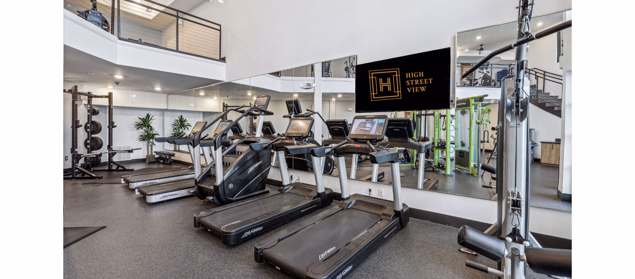 fitness center at High Street View Luxury Apartments