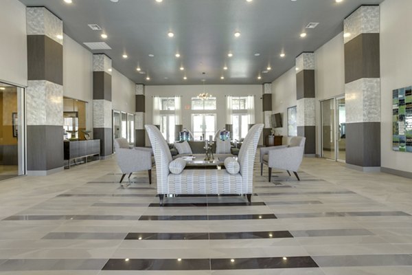 Elegant clubhouse with chic interiors at The Grayson Apartments, perfect for social gatherings and relaxation