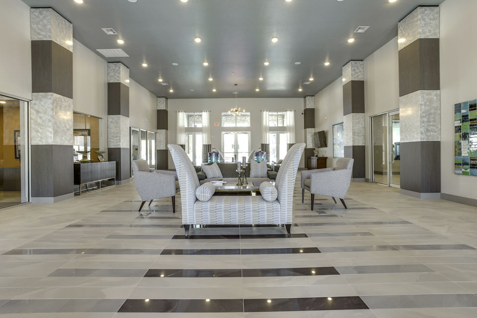 Elegant clubhouse with chic interiors at The Grayson Apartments, perfect for social gatherings and relaxation