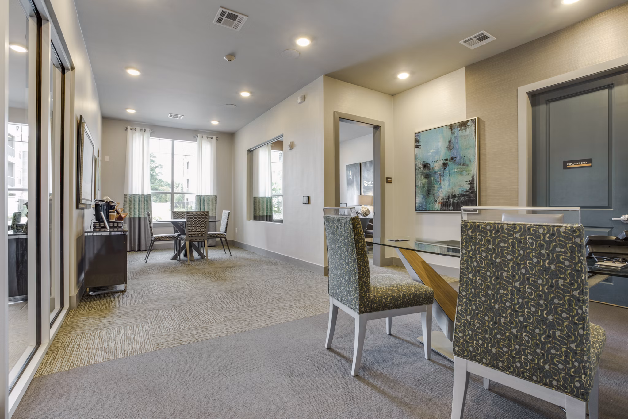 Clubhouse featuring modern design and spacious seating at The Grayson Apartments luxury community