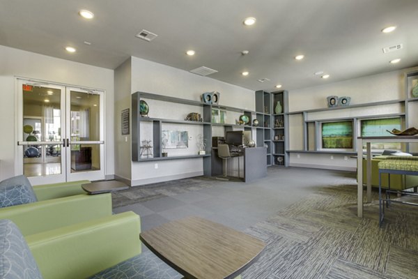 Elegant clubhouse with modern furnishings at The Grayson Apartments, offering luxury living spaces and amenities in a prime location