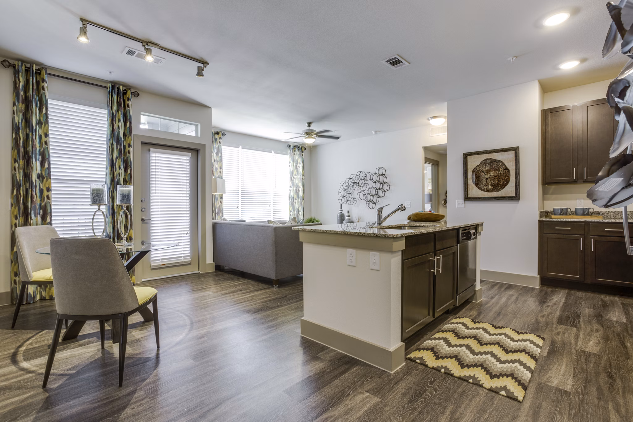 Dining room featuring modern decor and ambient lighting at The Grayson Apartments