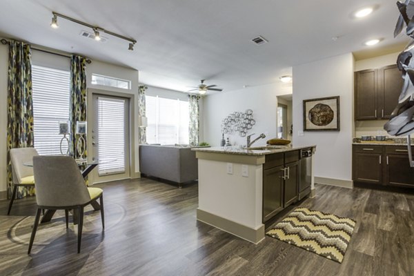 Dining room featuring modern decor and ambient lighting at The Grayson Apartments