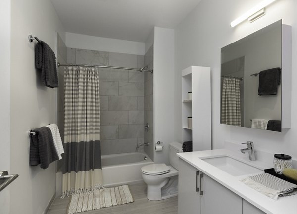 Modern bathroom with sleek fixtures at Watermark Central Apartments