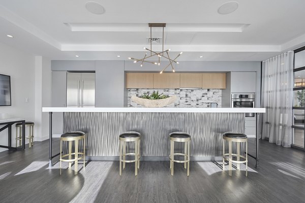 Clubhouse kitchen with modern appliances at Watermark Central Apartments