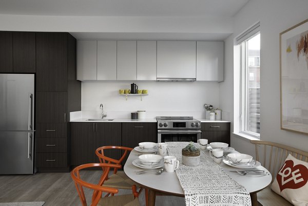 Elegant dining room with modern furnishings in Watermark Central Apartments
