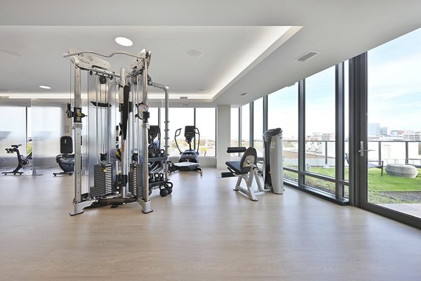 State-of-the-art fitness center with modern equipment at Watermark Central Apartments