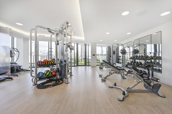 State-of-the-art fitness center with modern equipment at Watermark Central luxury apartments