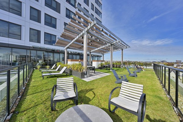 Private balcony with modern furnishings at Watermark Central Apartments, offering scenic views in premium luxury apartments