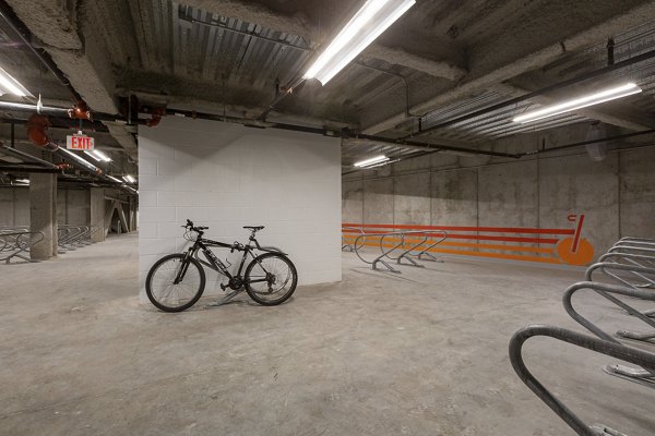 Bike storage facility at Watermark Central Apartments featuring secure racks and ample space for resident bicycles