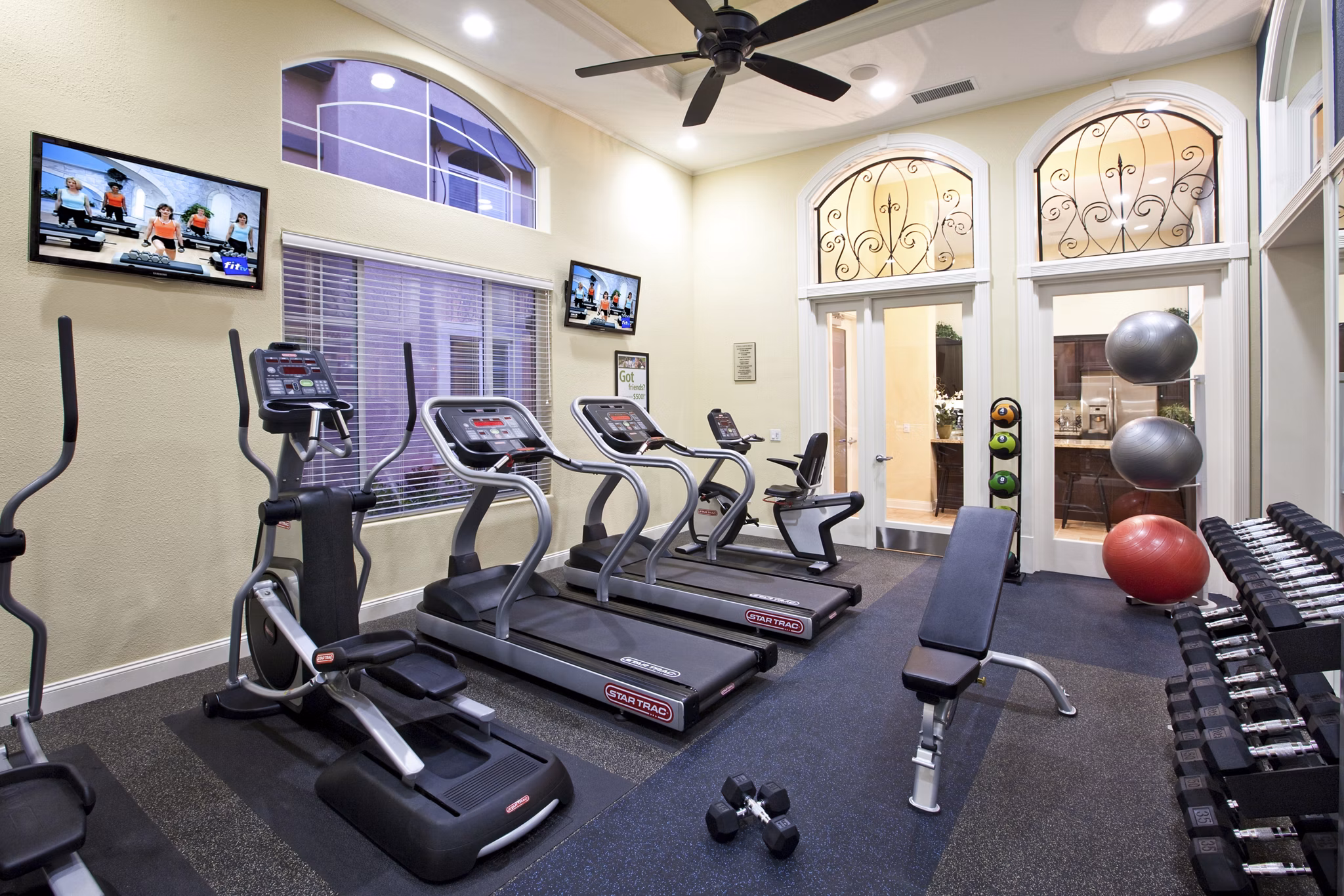 fitness center at St. Claire Apartment Homes