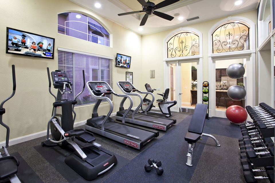 fitness center at St. Claire Apartment Homes