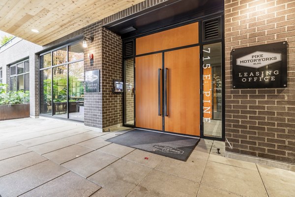 Pike Motorworks Apartments: Historic brick facade luxury apartments in Seattle's Capitol Hill neighborhood