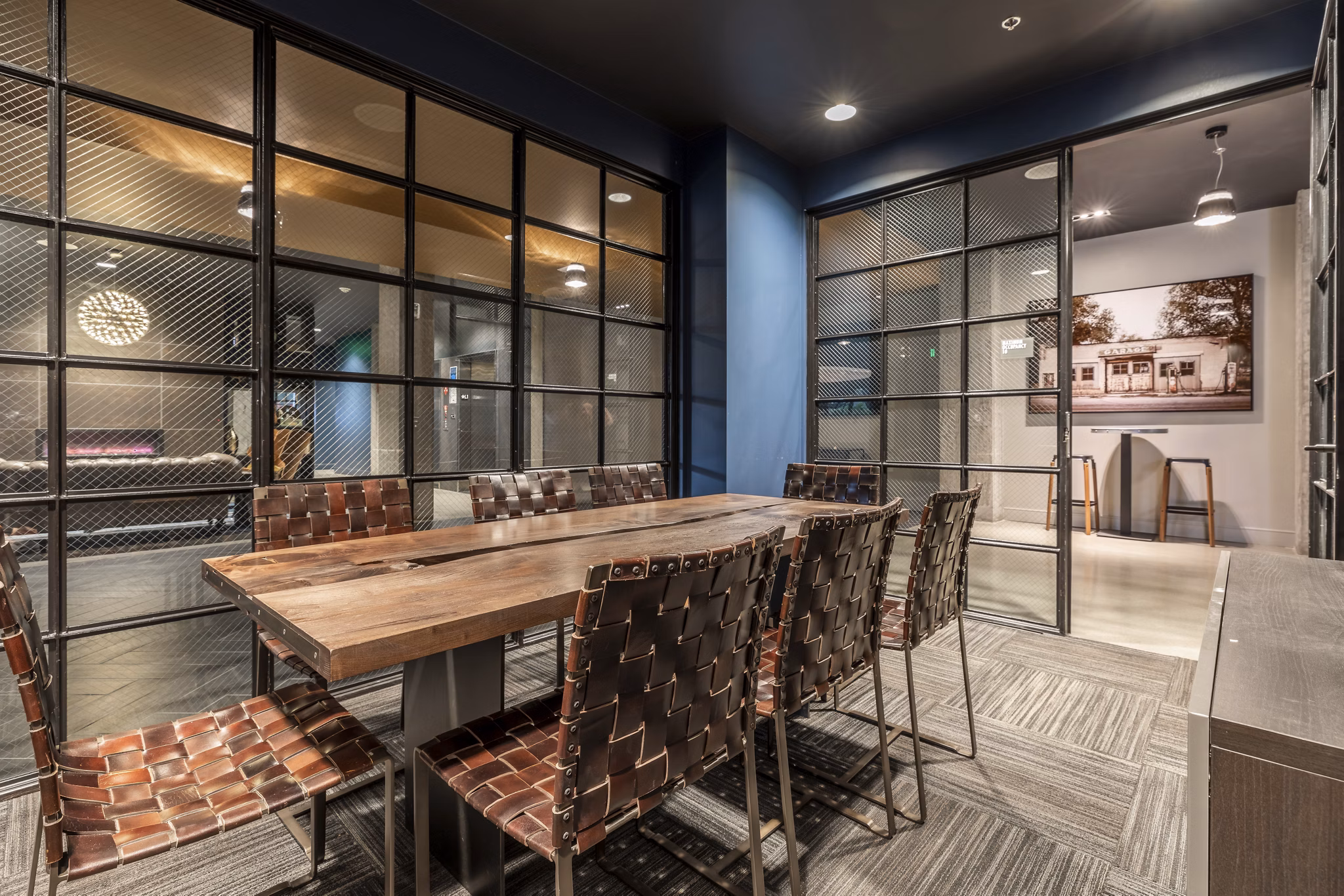Meeting facility with modern design at Pike Motorworks Apartments, perfect for events and gatherings in a stylish urban setting