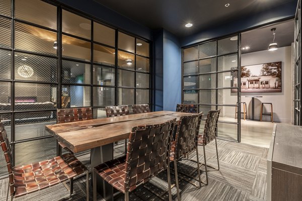 Meeting facility with modern design at Pike Motorworks Apartments, perfect for events and gatherings in a stylish urban setting