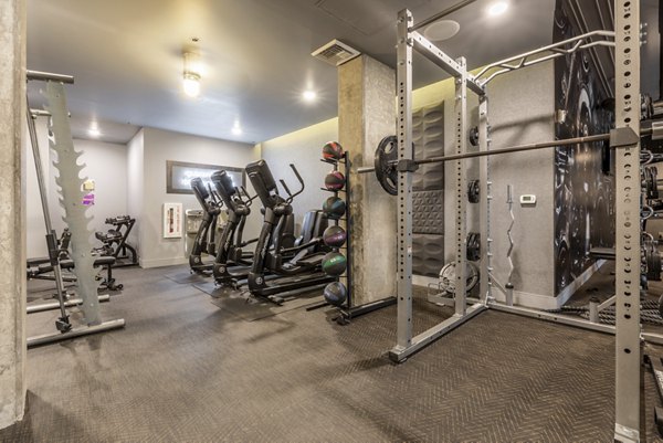 fitness center at Pike Motorworks Apartments