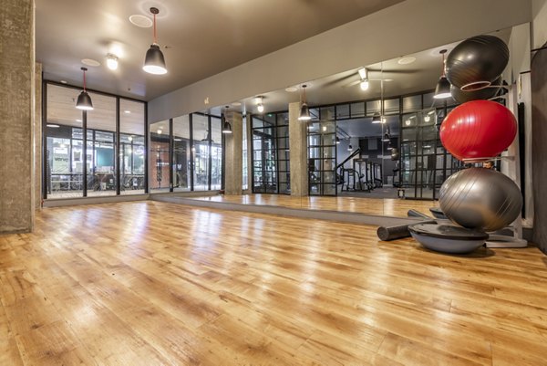 fitness center at Pike Motorworks Apartments