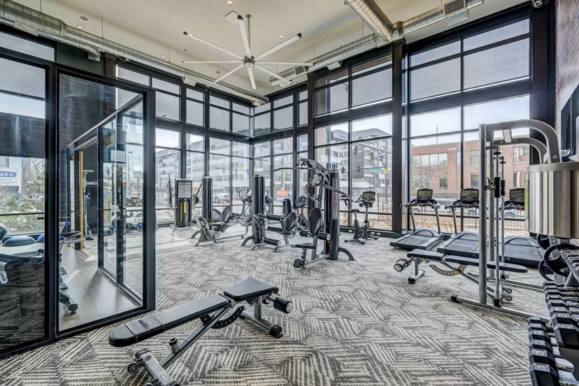 Modern fitness center with state-of-the-art equipment at Mason at Alameda Station Apartments, ideal for health and wellness enthusiasts
