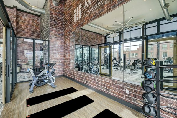 Mason at Alameda Station: Modern yoga/spin studio with state-of-the-art equipment for residents' fitness needs
