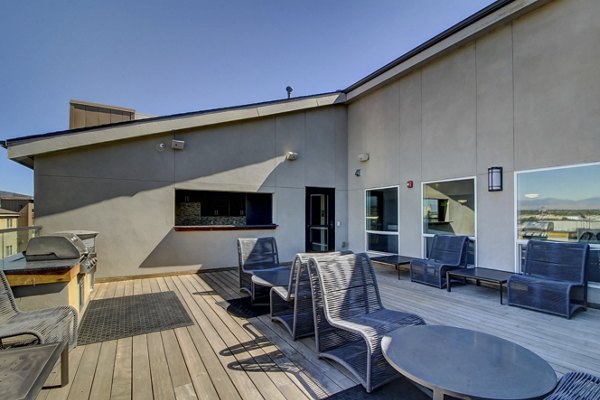 Grill area with modern barbecue stations at Mason at Alameda Station Apartments