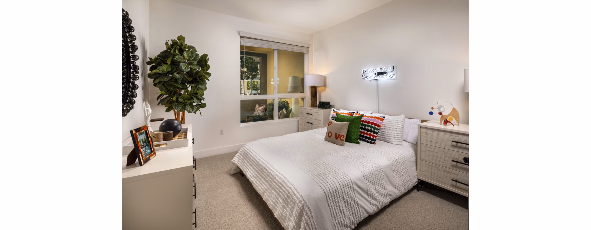 Cozy bedroom with modern decor in Clarendon Apartments, luxury living space
