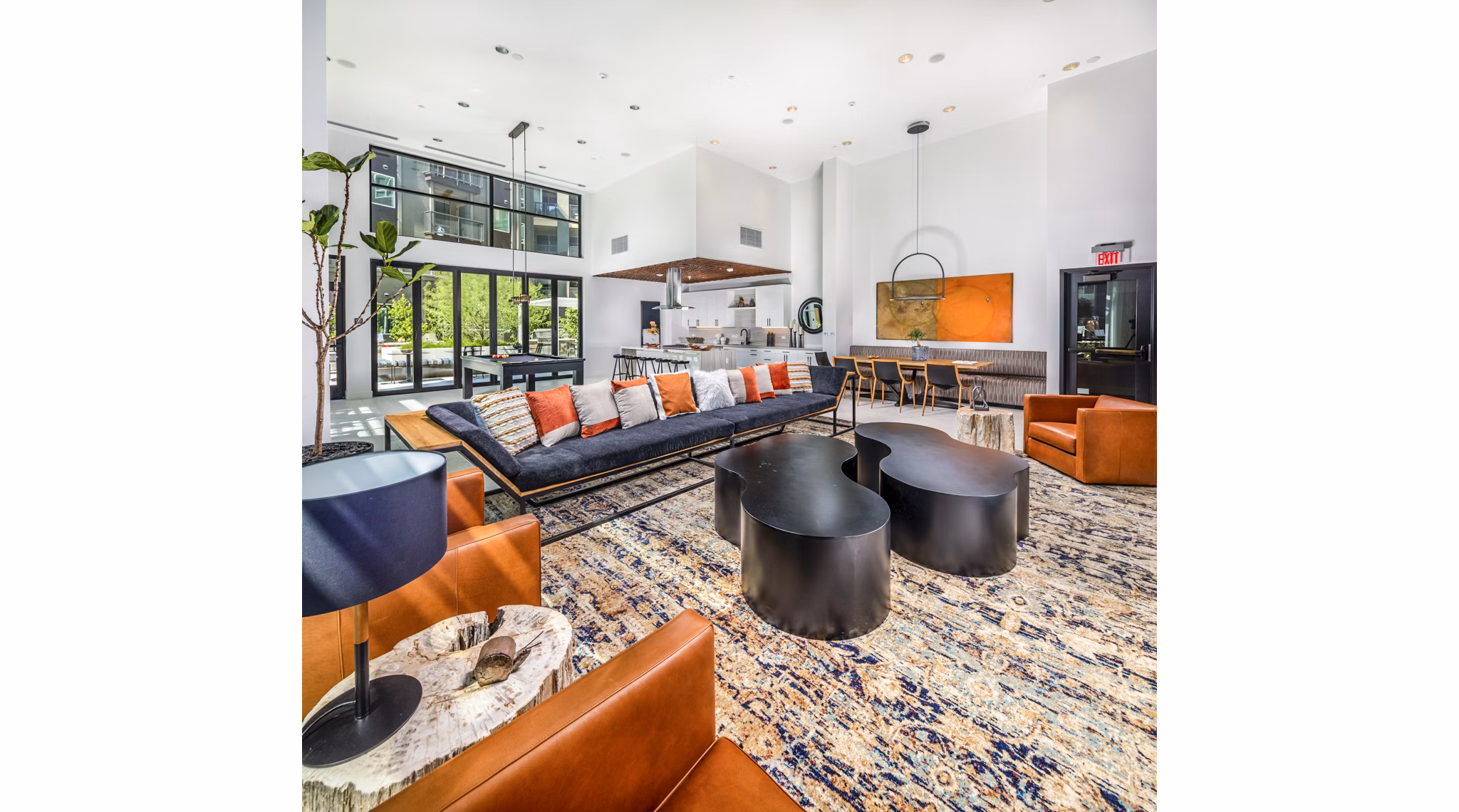 Stylish lounge area in Clarendon Apartments clubhouse with modern decor