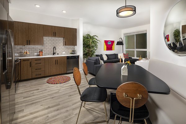 Elegant dining area with contemporary furnishings at Clarendon Apartments